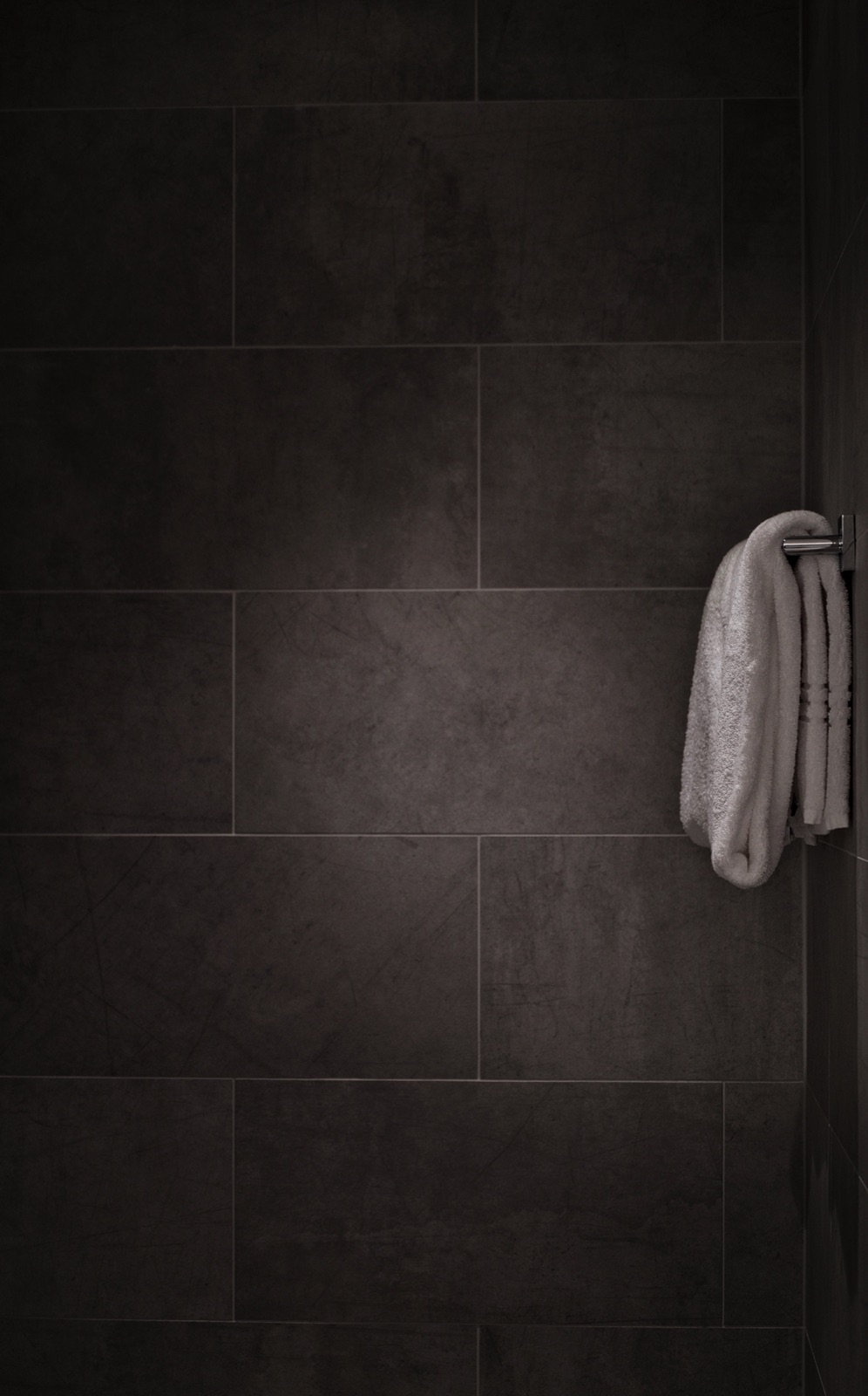 Tiled bathroom with a walk-in shower