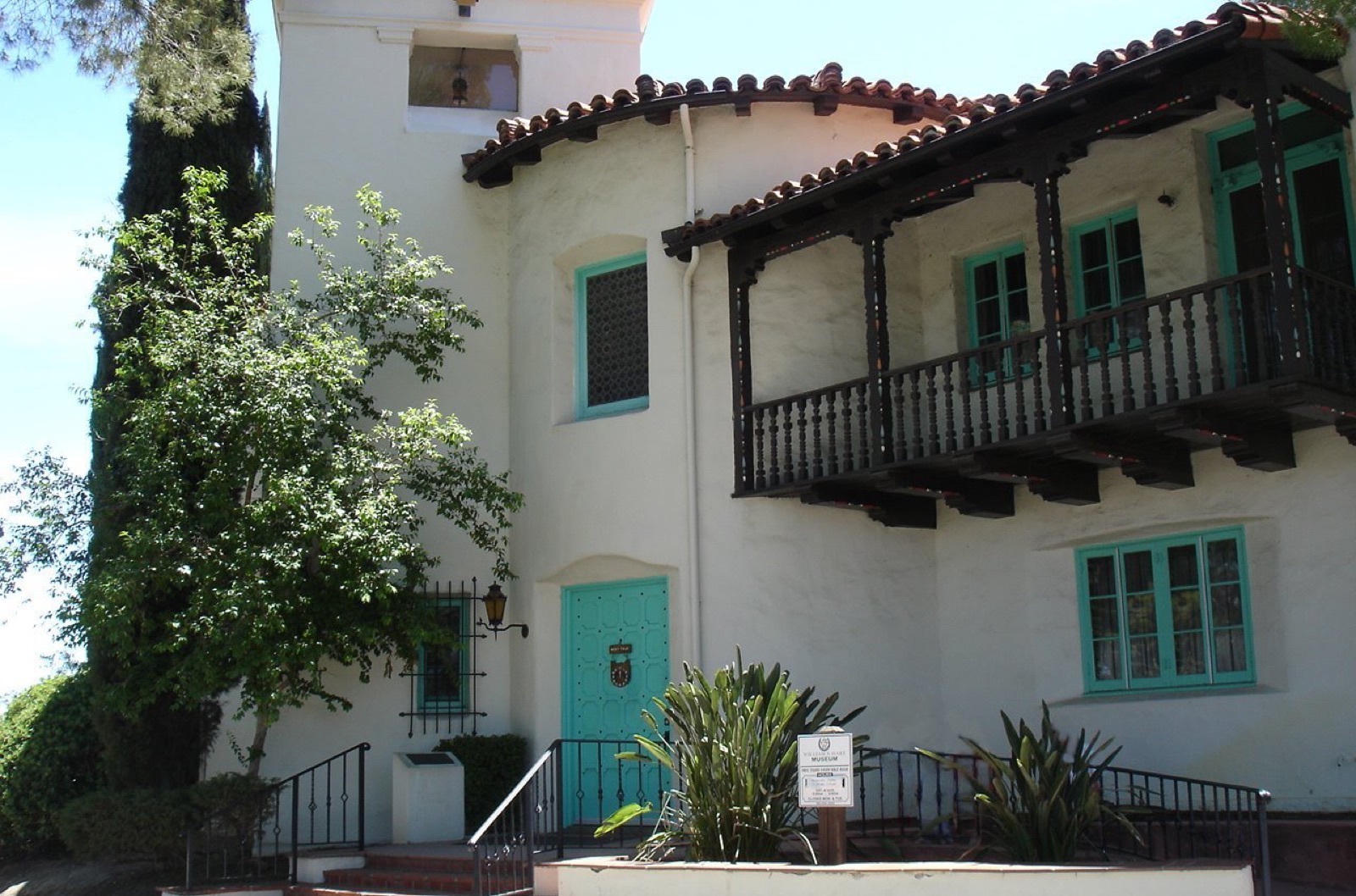 Spanish Revival stucco house with a tiled roof