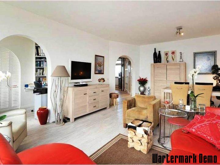 Five-Bedroom Town House on Rue de Rivoli - Second living room with arched alcoves and a light oak sideboard